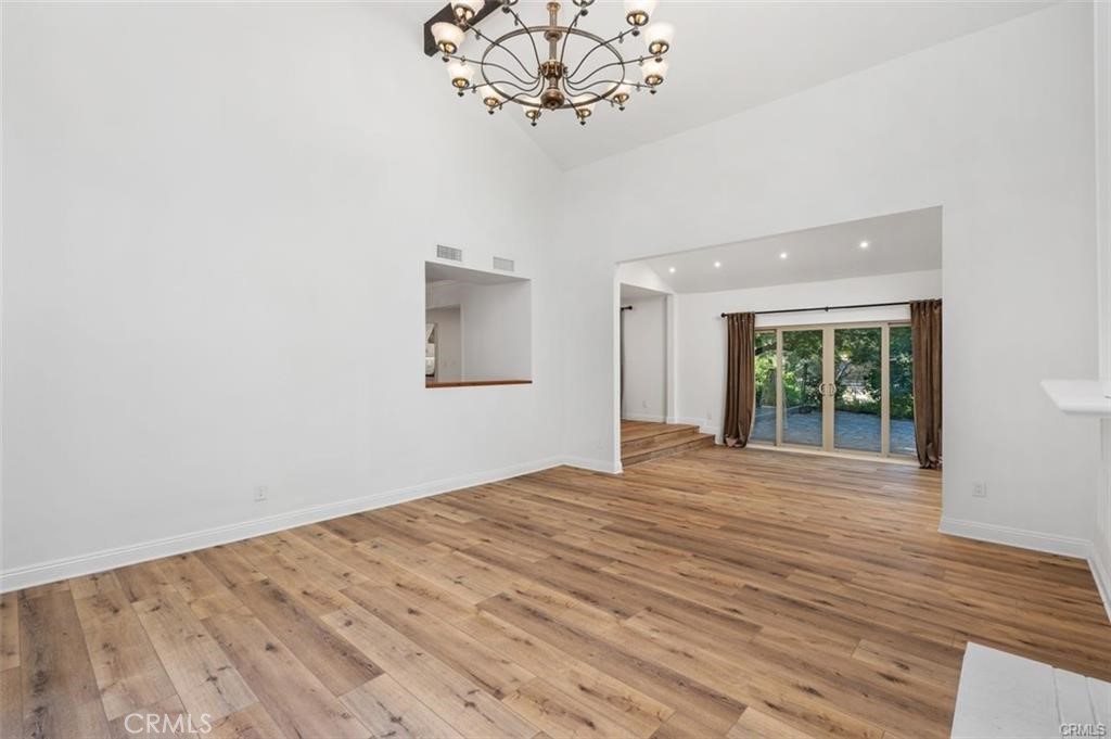 119 Bell Cyn Road Bell Canyon, CA 91307 - Photo 20 of 39 a view of empty room with wooden floor and fan