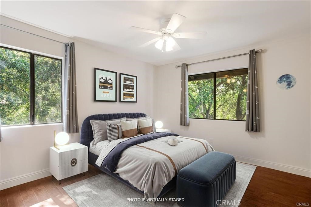 119 Bell Cyn Road Bell Canyon, CA 91307 - Photo 26 of 39 a bedroom with a bed and a large window