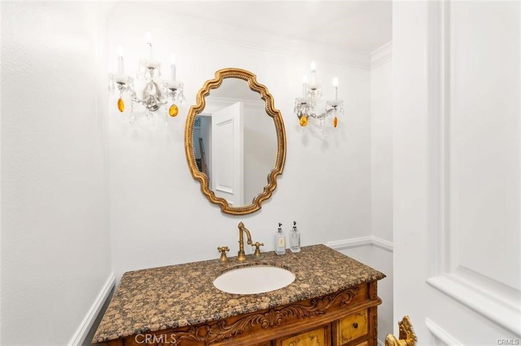 119 Bell Cyn Road Bell Canyon, CA 91307 - Photo 39 of 39 a bathroom with a sink and a mirror