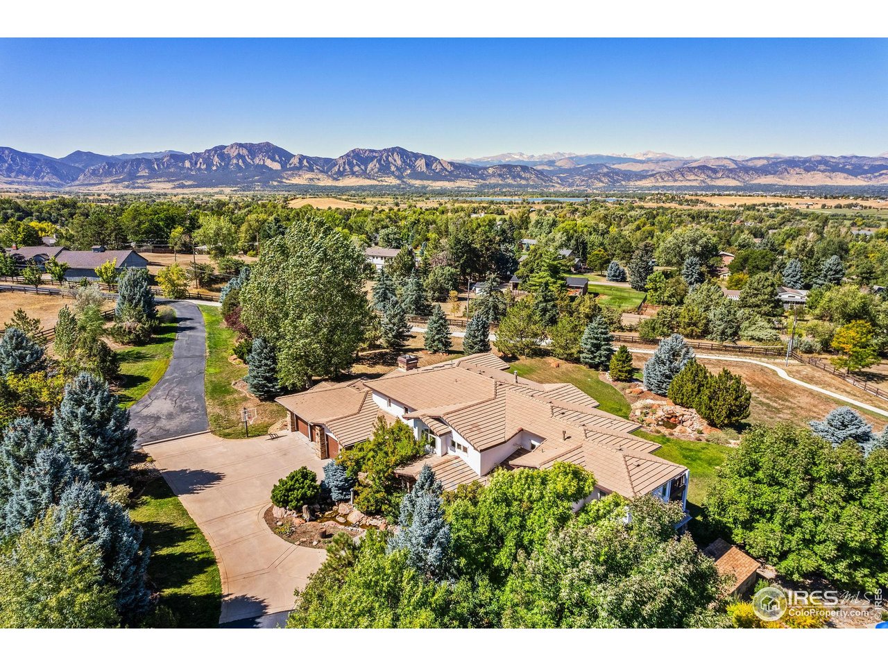 a view of a city with mountains in the background