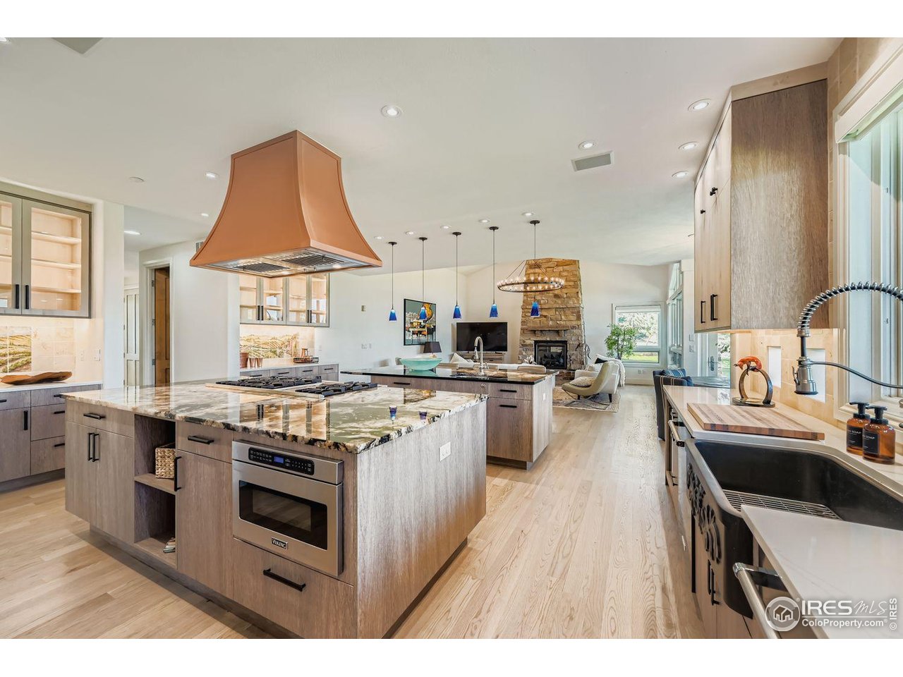 8001 Fairview Road Boulder, CO 80303 - Photo 12 of 49 a kitchen with a stove a sink and a refrigerator