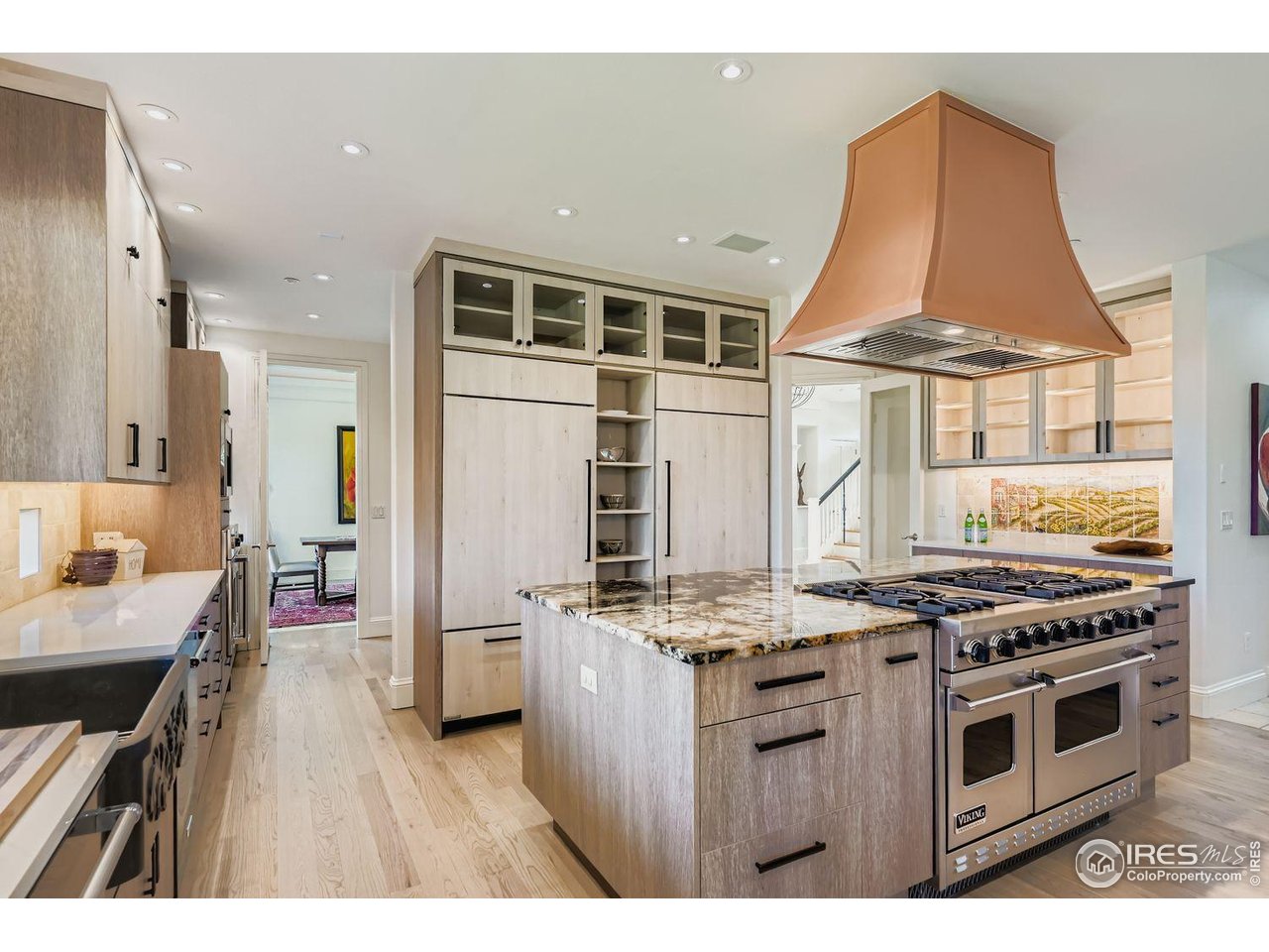 8001 Fairview Road Boulder, CO 80303 - Photo 13 of 49 a kitchen with stainless steel appliances a stove a sink dishwasher and cabinets