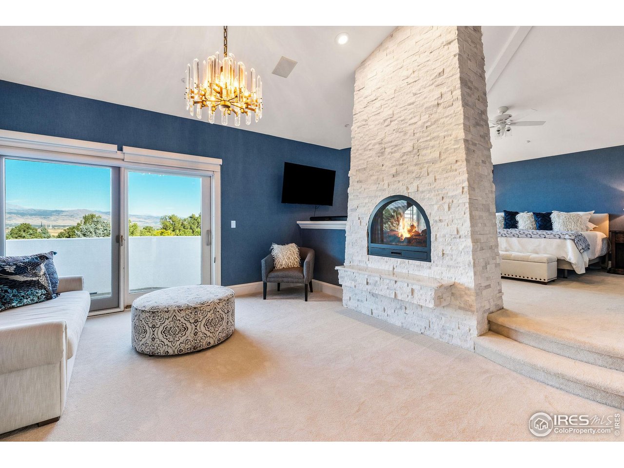 8001 Fairview Road Boulder, CO 80303 - Photo 18 of 49 a living room with furniture and a flat screen tv