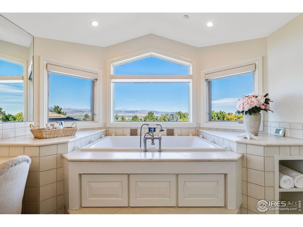8001 Fairview Road Boulder, CO 80303 - Photo 23 of 49 a bathroom with a sink double vanity and a mirror