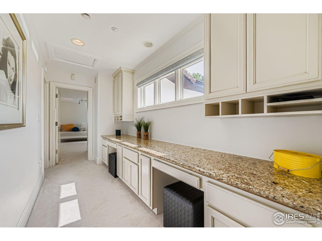 8001 Fairview Road Boulder, CO 80303 - Photo 26 of 49 a kitchen with stainless steel appliances granite countertop a sink and cabinets