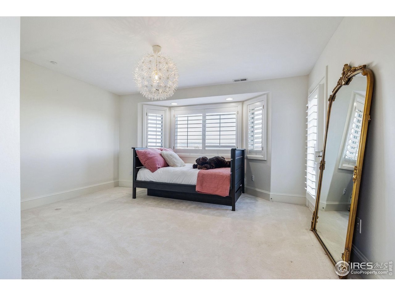 8001 Fairview Road Boulder, CO 80303 - Photo 27 of 49 a living room with furniture and a flat screen tv