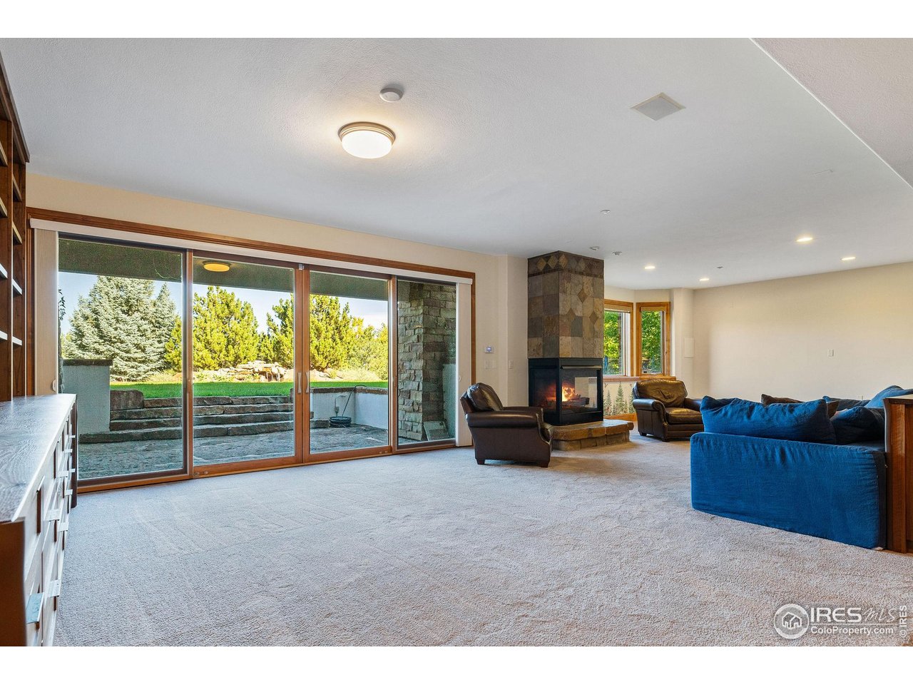 8001 Fairview Road Boulder, CO 80303 - Photo 30 of 49 a living room with furniture and a large window
