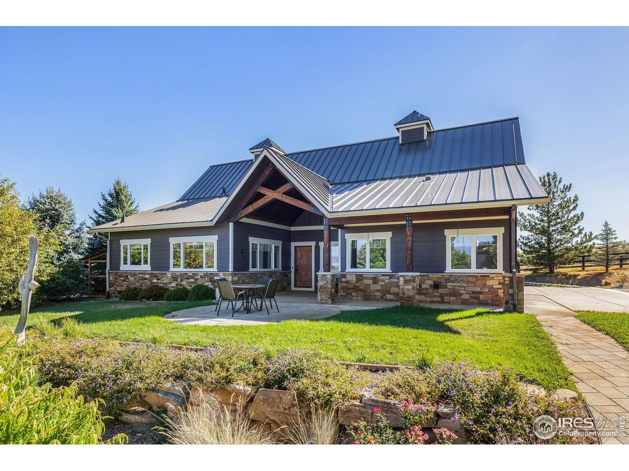 8001 Fairview Road Boulder, CO 80303 - Photo 36 of 49 a front view of a house with a yard