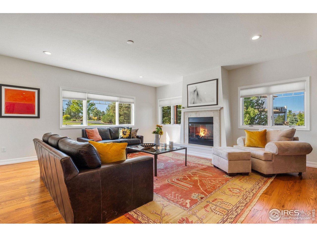 8001 Fairview Road Boulder, CO 80303 - Photo 38 of 49 a living room with furniture and a fireplace