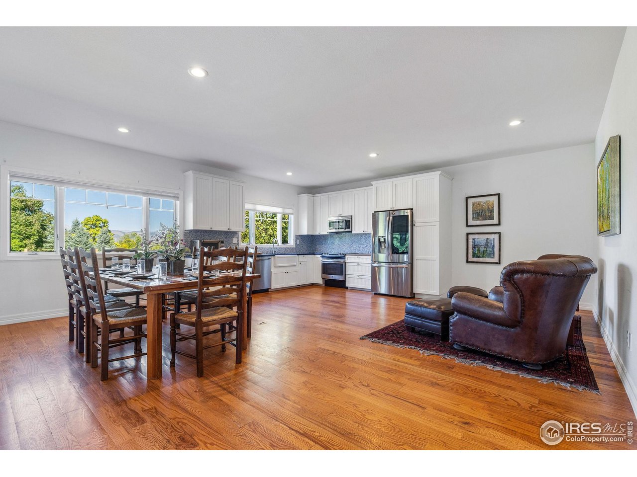 8001 Fairview Road Boulder, CO 80303 - Photo 39 of 49 a living room with furniture and wooden floor