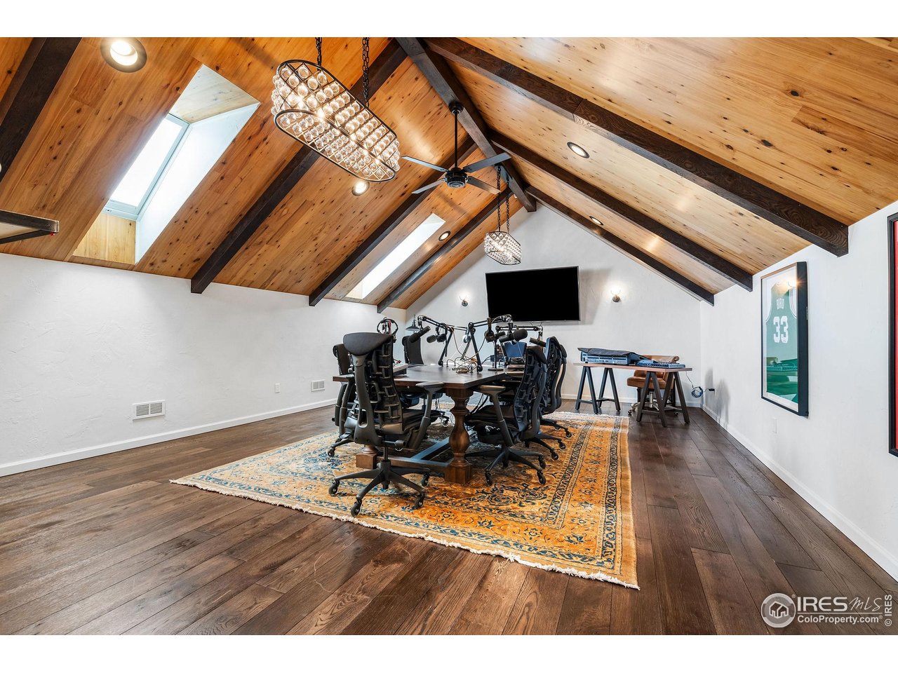 8001 Fairview Road Boulder, CO 80303 - Photo 43 of 49 a dining room with furniture and wooden floor