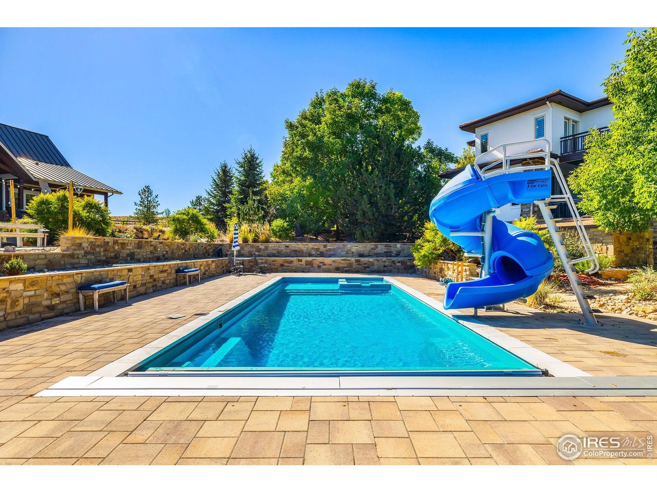 8001 Fairview Road Boulder, CO 80303 - Photo 45 of 49 a view of a swimming pool with an outdoor seating