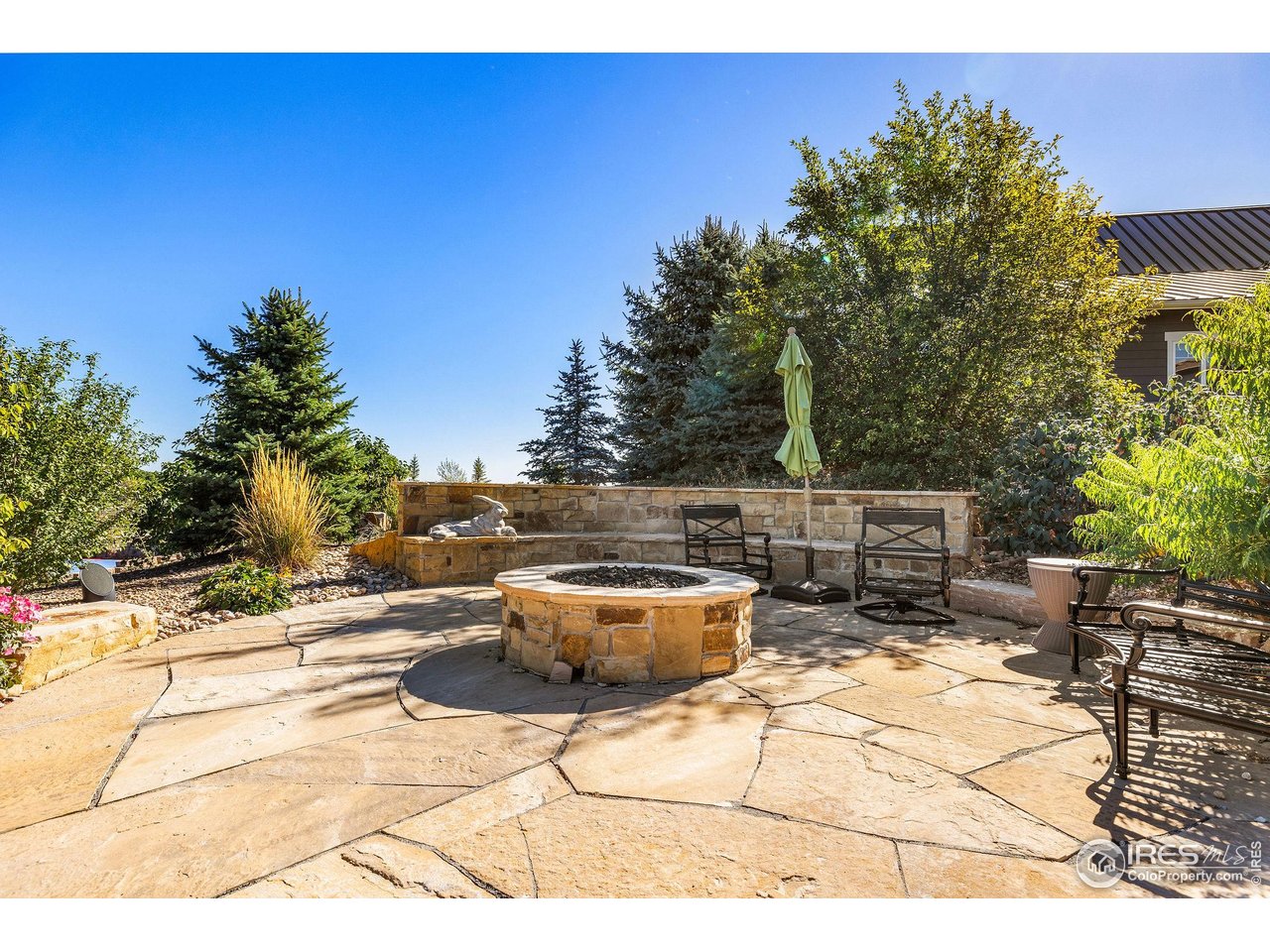 8001 Fairview Road Boulder, CO 80303 - Photo 48 of 49 a view of a backyard with sitting area