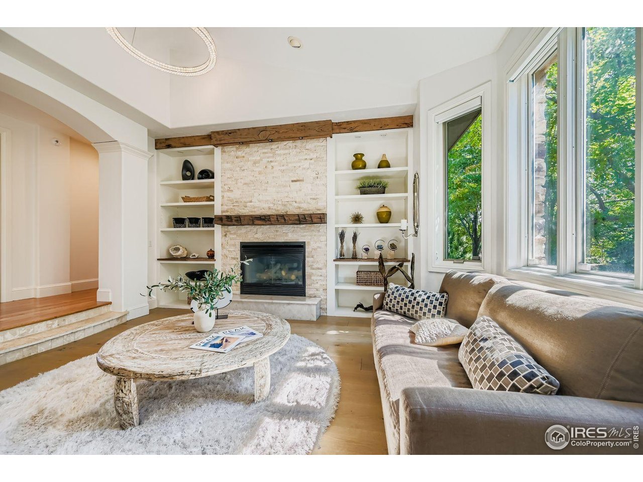 8001 Fairview Road Boulder, CO 80303 - Photo 7 of 49 a living room with furniture and a fireplace