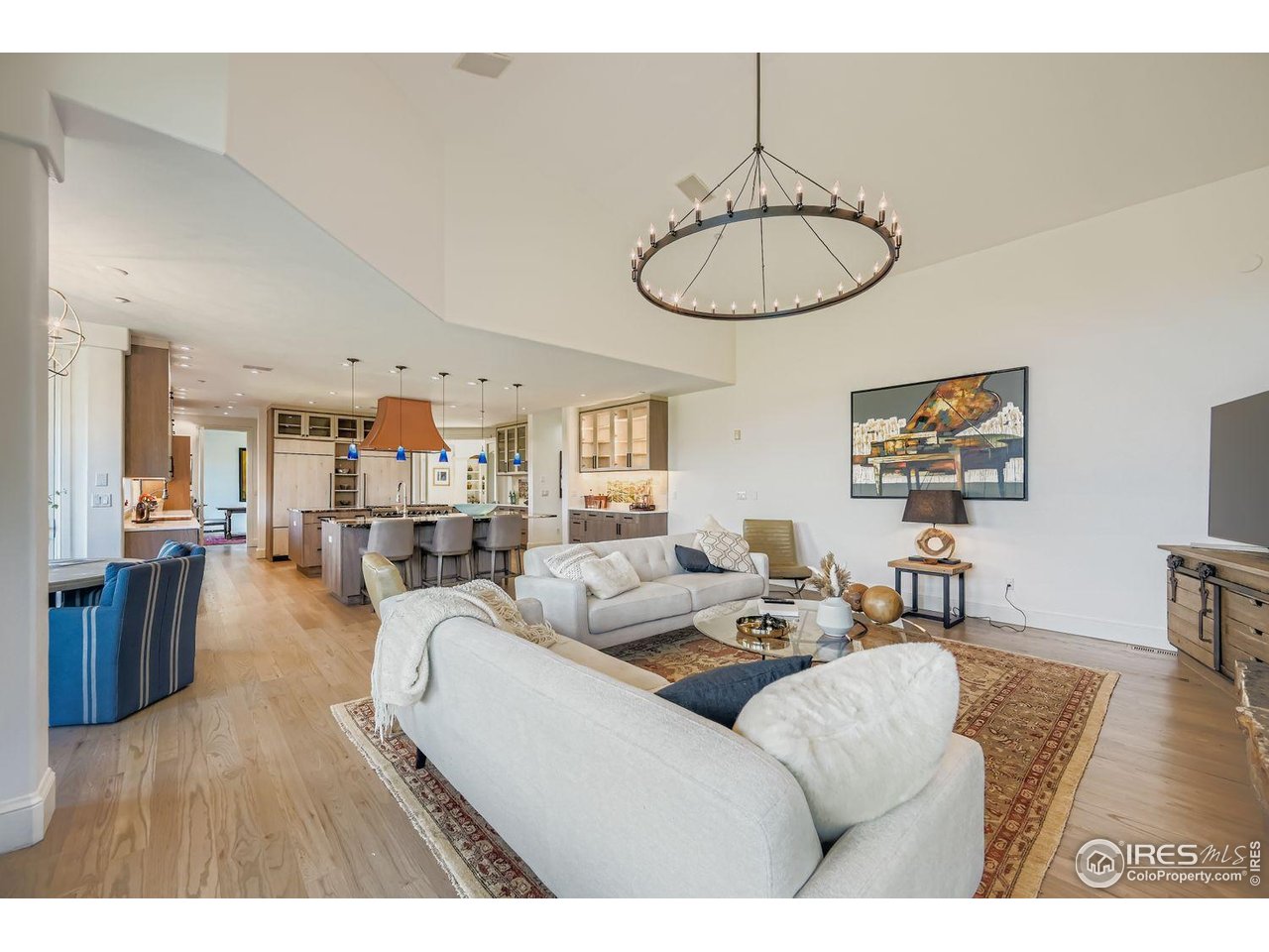 8001 Fairview Road Boulder, CO 80303 - Photo 10 of 49 a living room with furniture a dining table and wooden floor