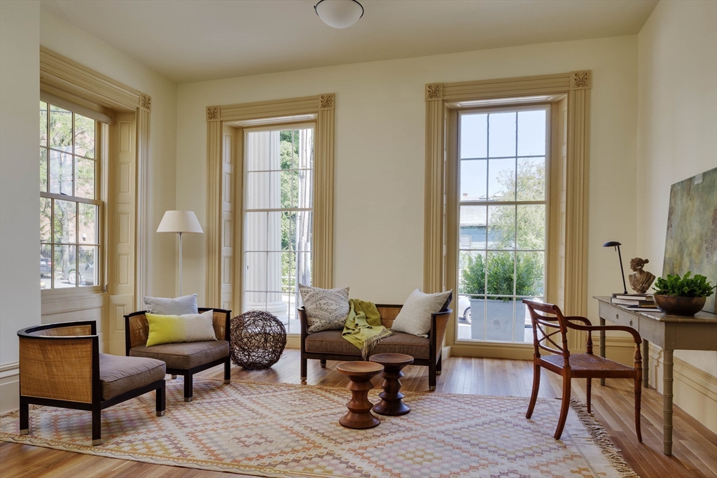 10 Linwood Street Boston, MA 02119 - Photo 13 of 33 a living room with furniture and floor to ceiling windows