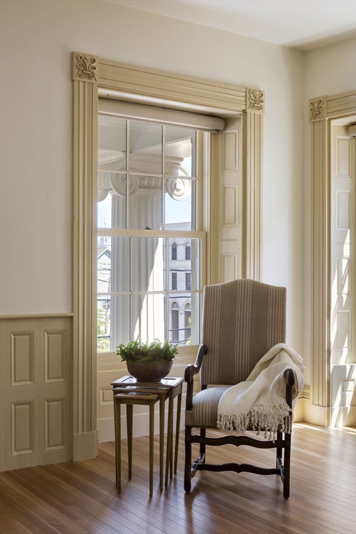 10 Linwood Street Boston, MA 02119 - Photo 17 of 33 a living room with furniture and a window