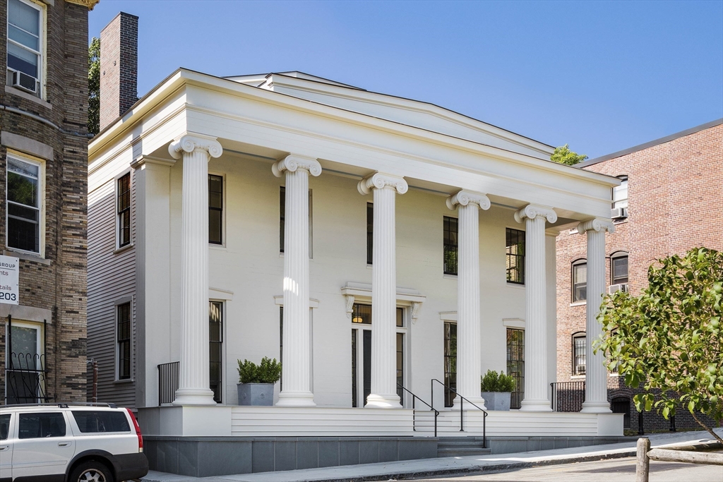 10 Linwood Street Boston, MA 02119 - Photo 2 of 33 a front view of a building with street view