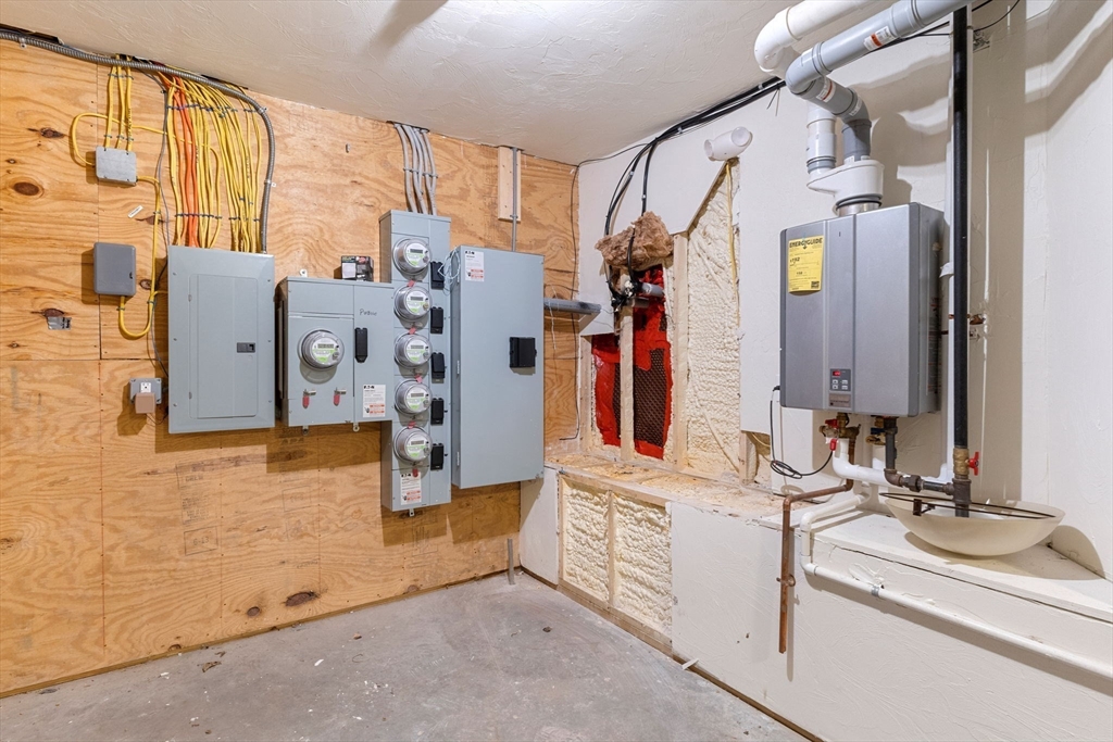 10 Linwood Street Boston, MA 02119 - Photo 31 of 33 a bathroom with double vanity sink and a mirror