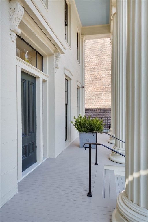10 Linwood Street Boston, MA 02119 - Photo 5 of 33 a view of entryway and hall with wooden floor