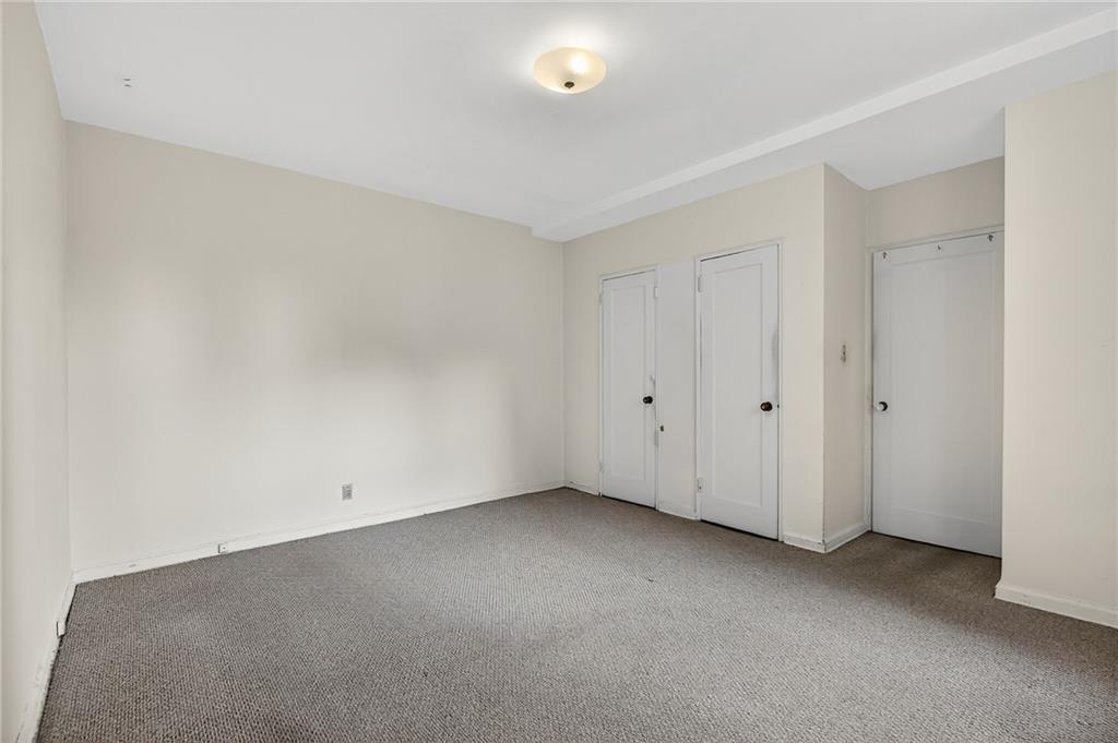 6801 Shore Road, Unit 2N Brooklyn, NY 11220 - Photo 9 of 16 a view of an empty room