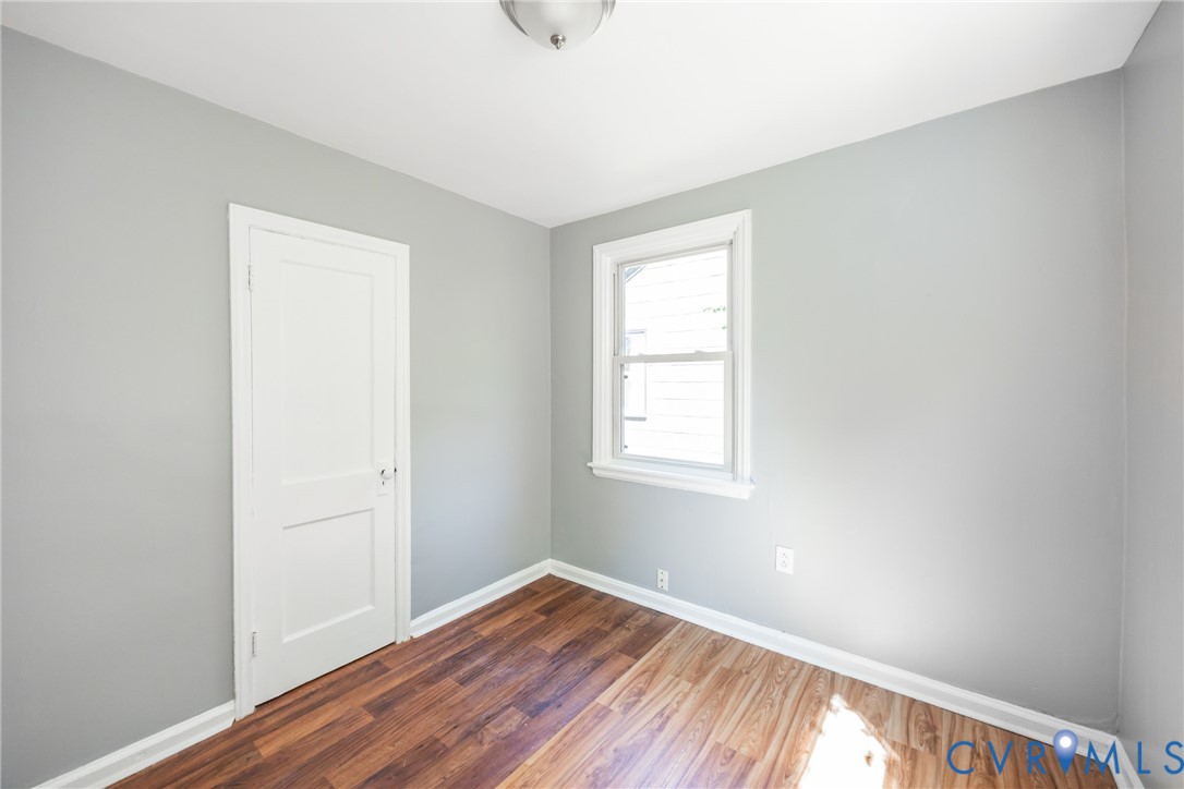 3505 Meadowbridge Road Richmond, VA 23222 - Photo 13 of 20 Wood-finish flooring, light gray wall paint, white
