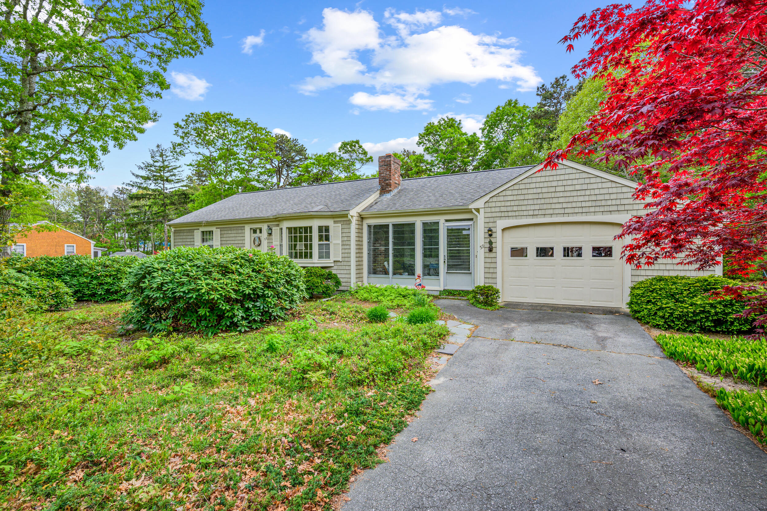 59 Beverly Road West Yarmouth, MA 02673 - Photo 1 of 33 a view of front of house with a yard