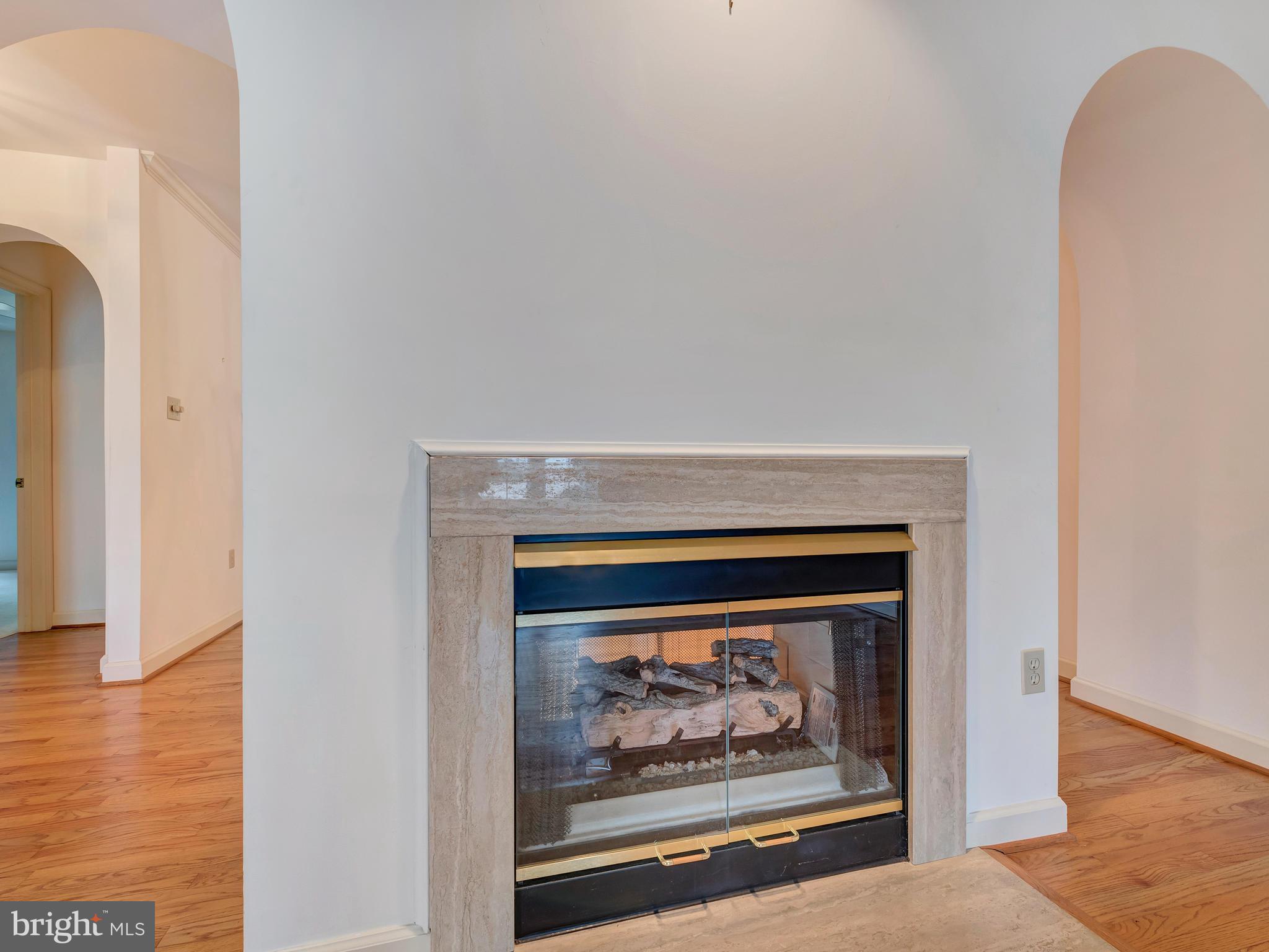 2447 Bear Den Road Frederick, MD 21701 - Photo 7 of 26 a view of a fireplace with a hallway