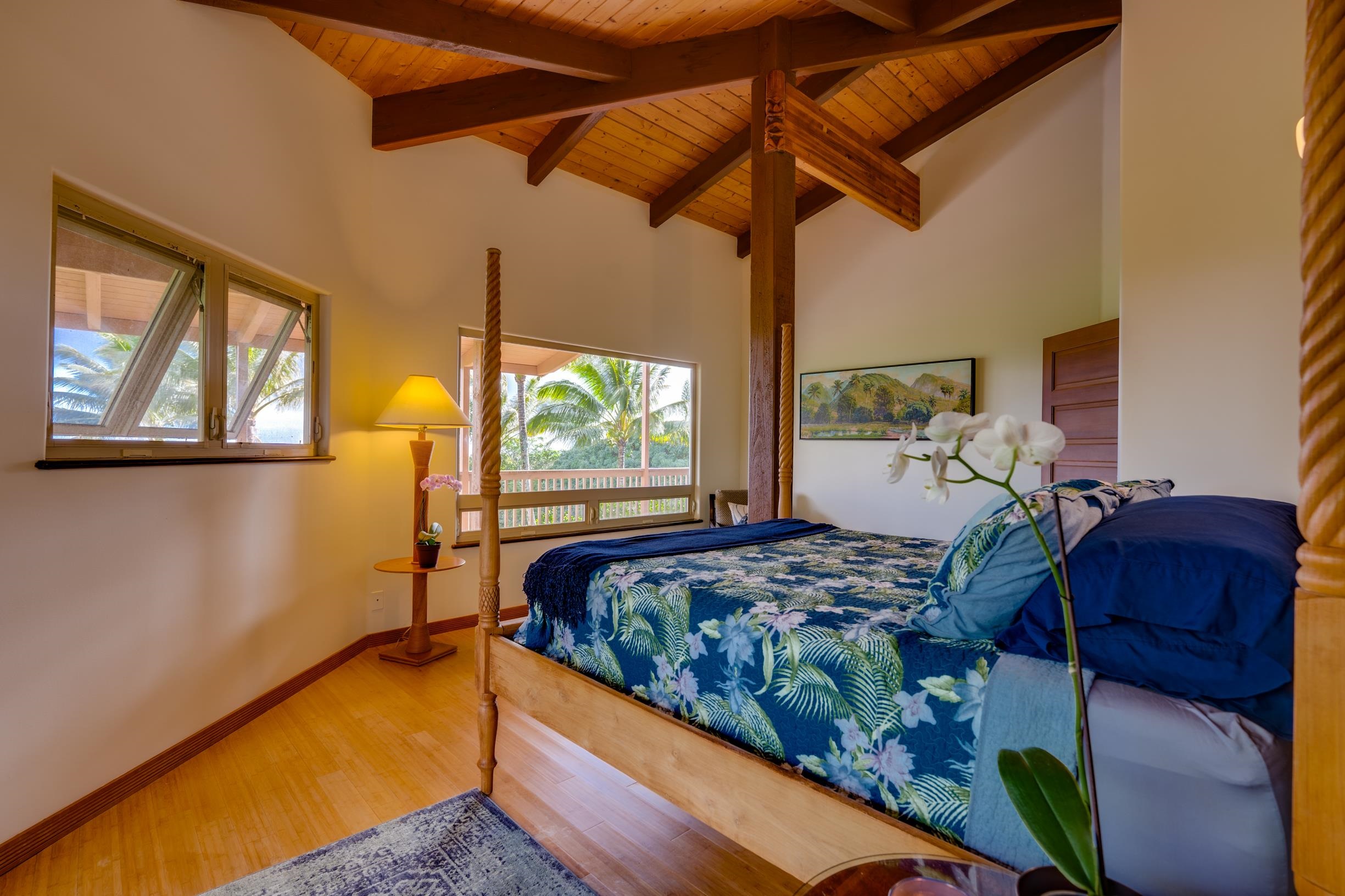 480 Puniawa Road Haiku, HI 96708 - Photo 20 of 30 a bedroom with a bed and a window