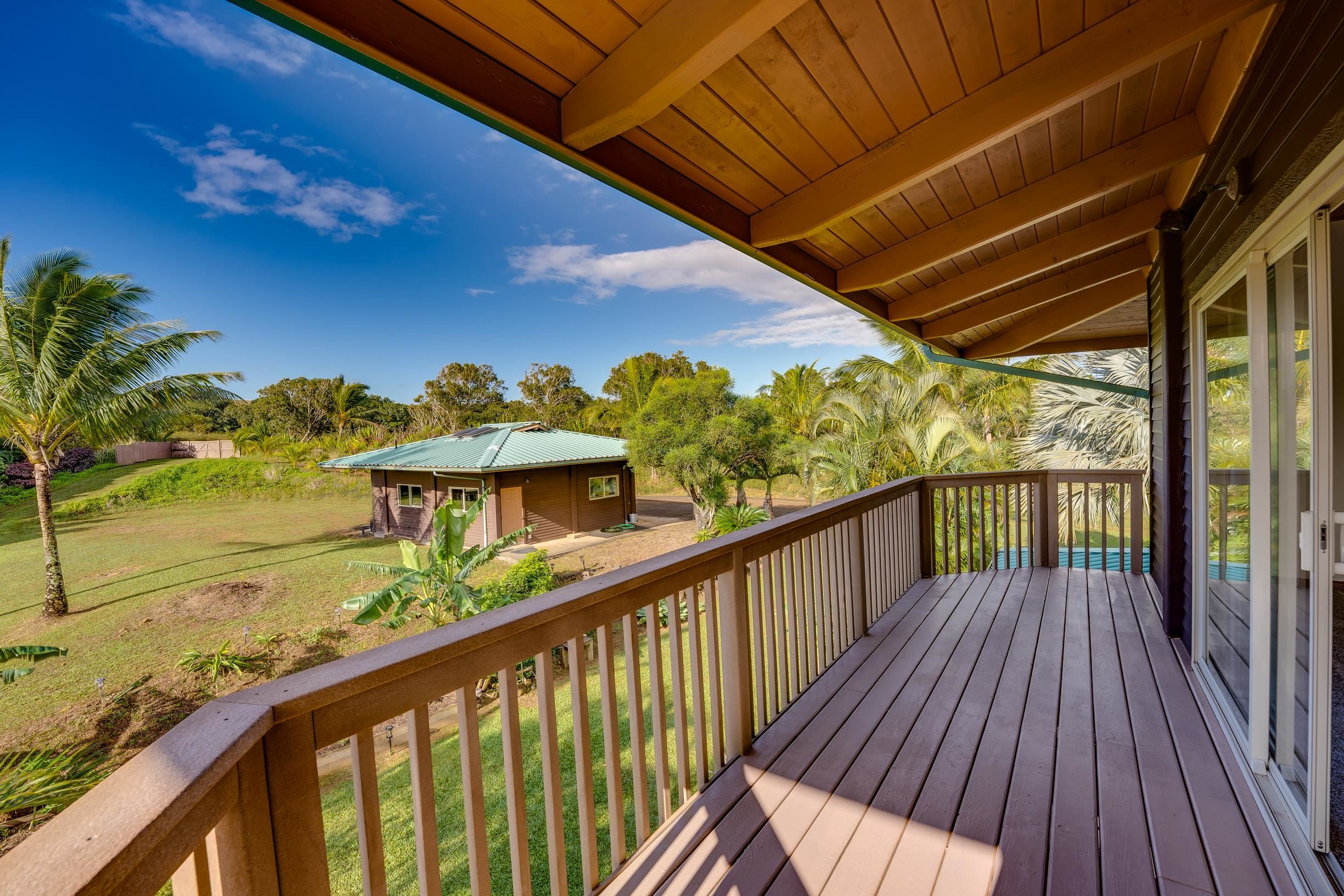 480 Puniawa Road Haiku, HI 96708 - Photo 28 of 30 a view of a balcony with wooden floor