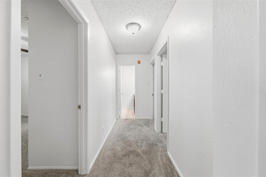 800 Howell Drive Coppell, TX 75019 - Photo 15 of 24 a view of a hallway