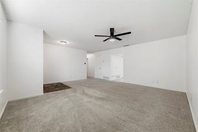a kitchen with stainless steel appliances granite countertop a refrigerator sink and cabinets