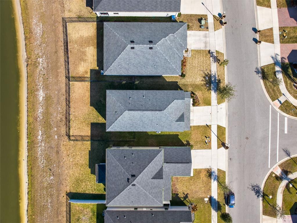 82 Berlin Avenue St. Cloud, FL 34771 - Photo 38 of 44 an aerial view of residential houses with outdoor space