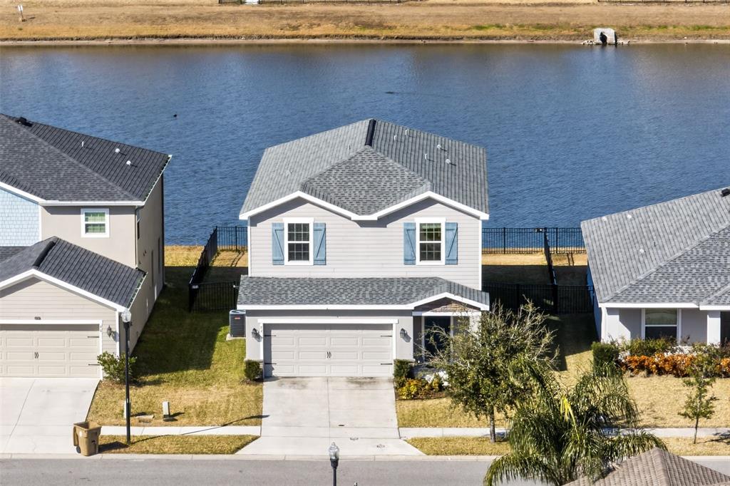 82 Berlin Avenue St. Cloud, FL 34771 - Photo 4 of 44 a front view of house with yard