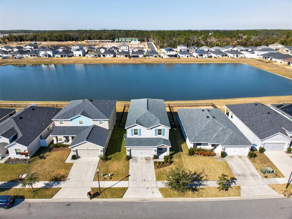 82 Berlin Avenue St. Cloud, FL 34771 - Photo 5 of 44 an aerial view of residential houses with outdoor space