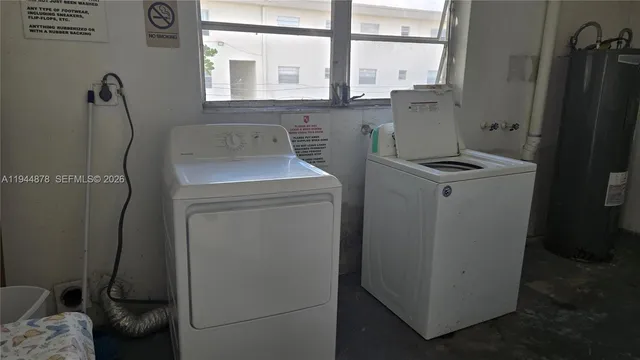 a utility room with dryer and washer