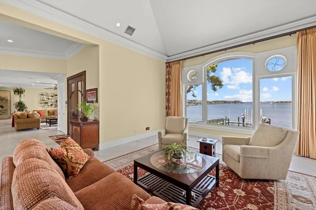 a kitchen with stainless steel appliances granite countertop a refrigerator and a stove