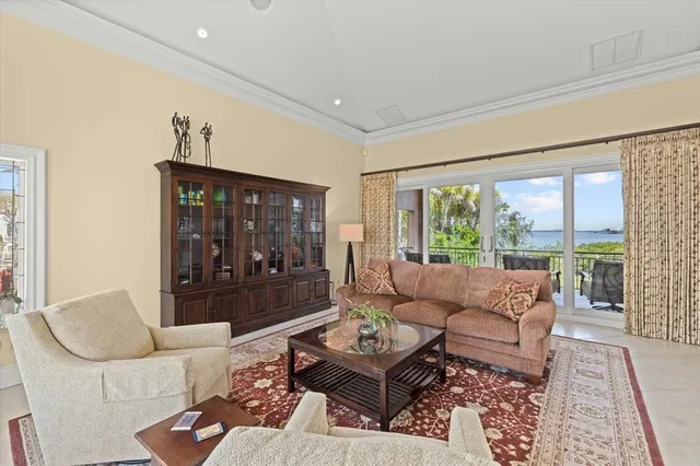 a kitchen with stainless steel appliances kitchen island granite countertop a sink and cabinets