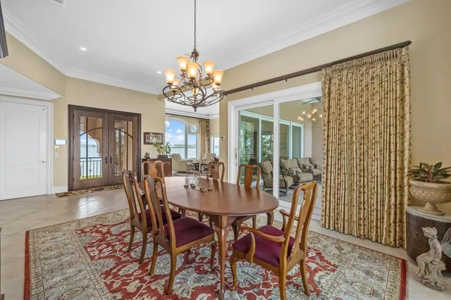 a bed room with a bed and a large window