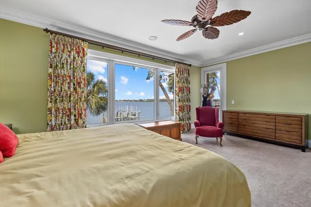 a view of a lake with houses in the back