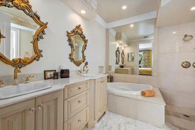 a balcony with table and chairs