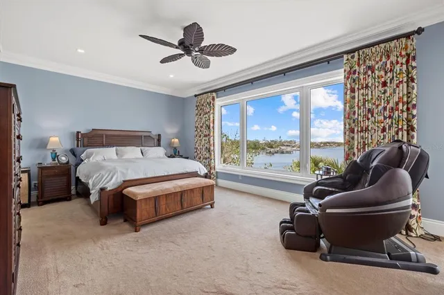 an aerial view of a house with a lake view