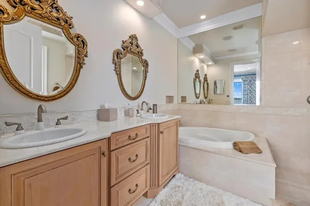 an aerial view of a house with a lake view