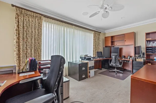 a view of a swimming pool with outdoor seating