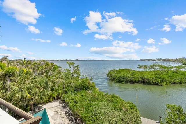 a front view of a residential houses with yard