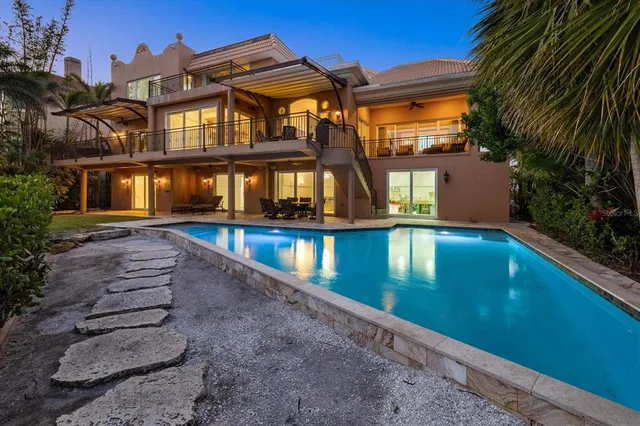 a view of houses with a yard