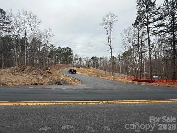 a view of a road with a snow on the road