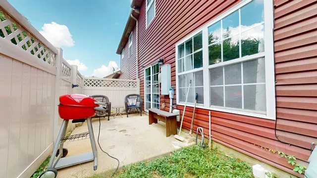 a close view of a table and chairs in the floor