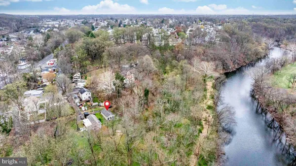 a view of a forest with a yard