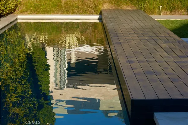 a aerial view of a house with a ocean view